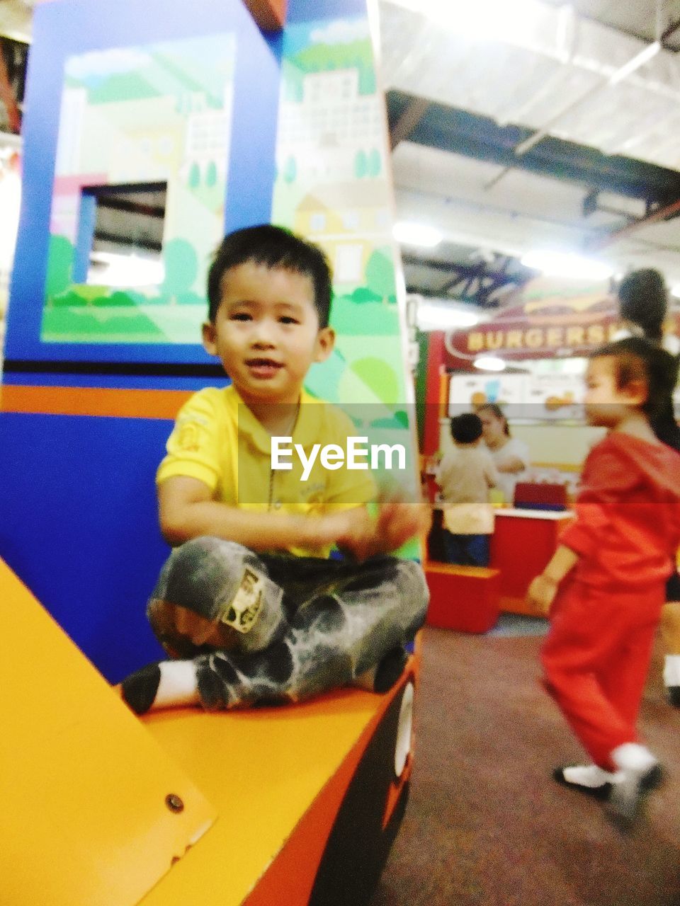 BOY PLAYING IN THE ROOM