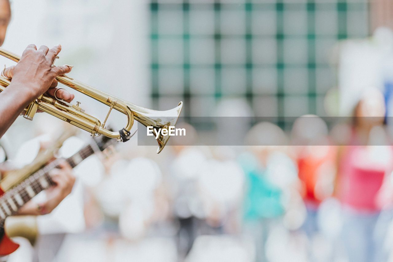 Close-up of hand playing trumpet