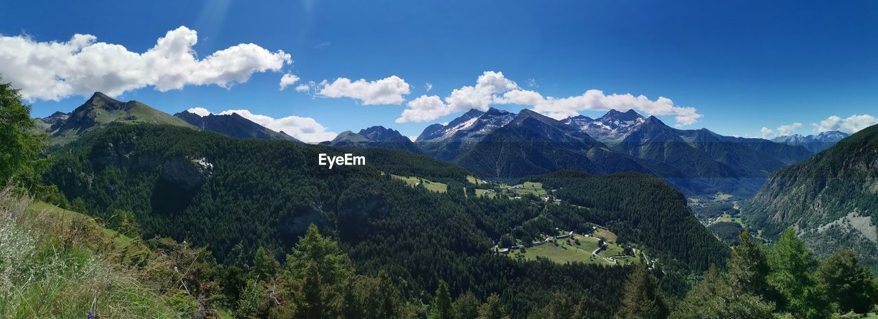 PANORAMIC SHOT OF MOUNTAINS AGAINST SKY