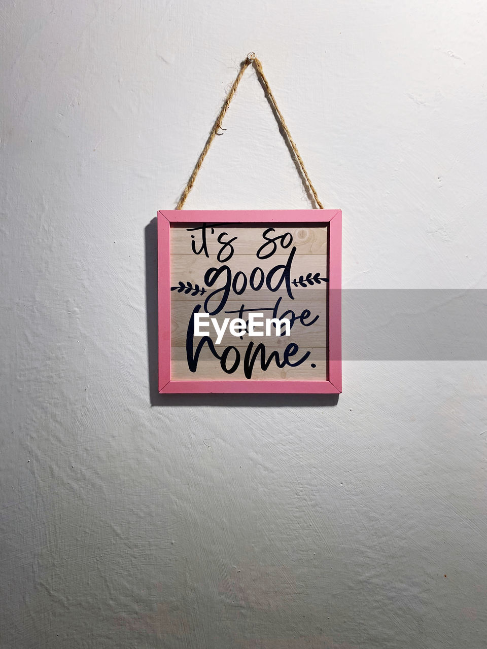 communication, text, pink, wall - building feature, sign, western script, hanging, no people, indoors