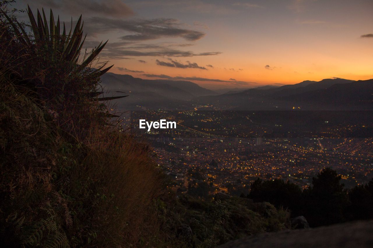 Scenic view of landscape against sky during sunset