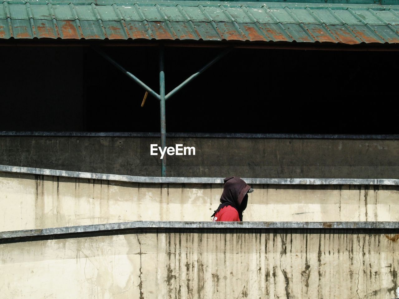 WOMAN STANDING ON GROUND