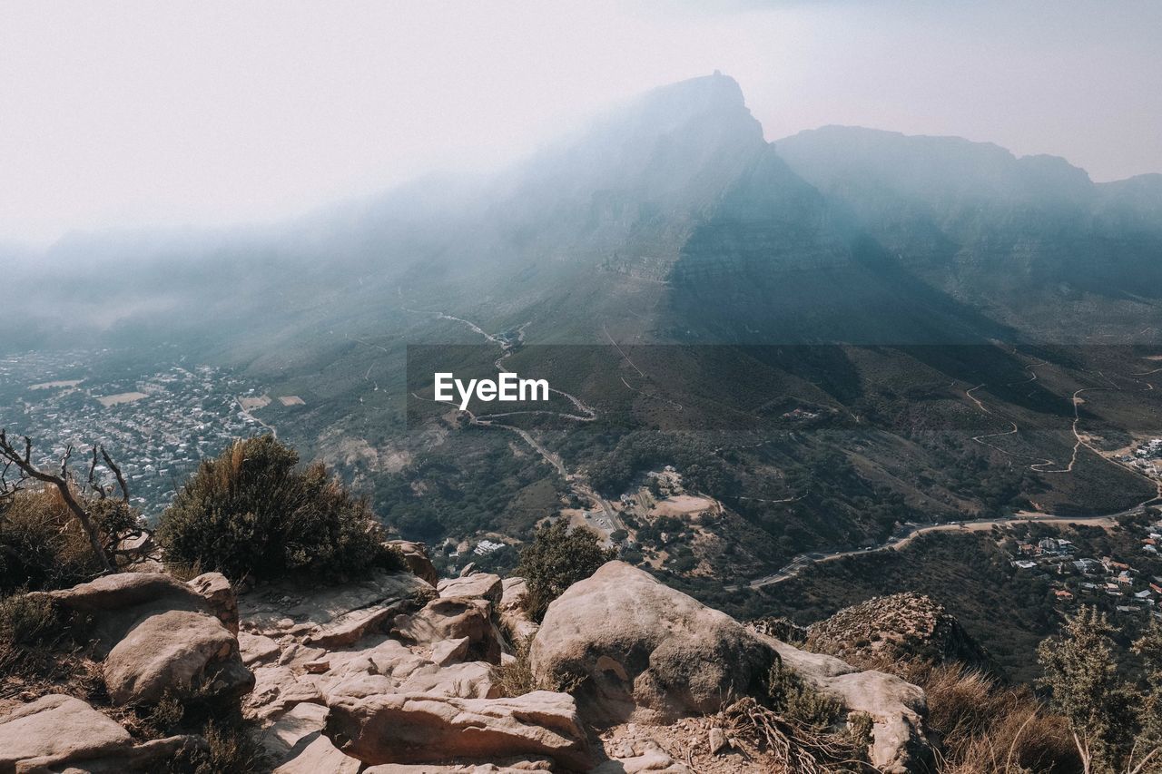 Aerial view of mountains against sky