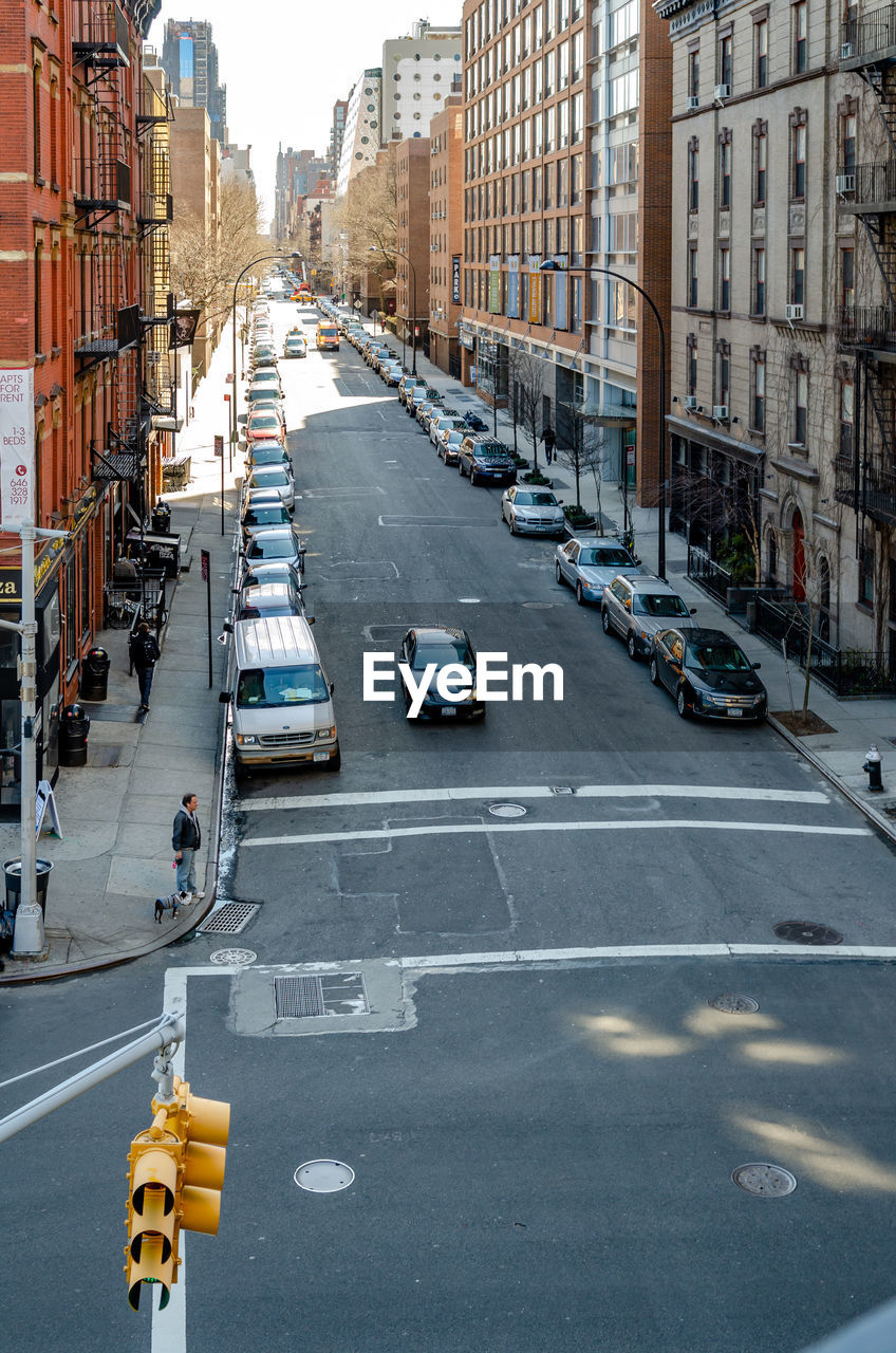 high angle view of people on street in city