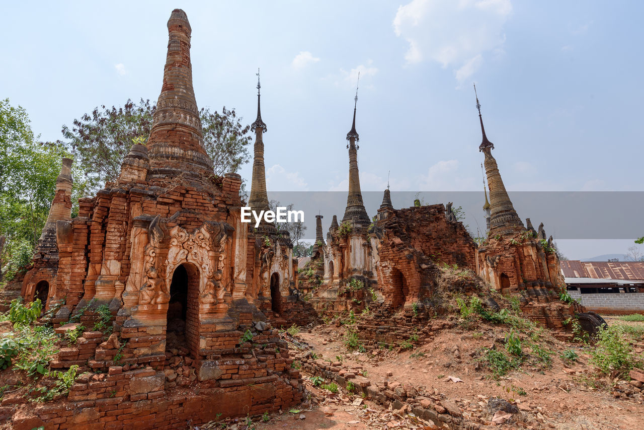 VIEW OF TEMPLE AGAINST BUILDING
