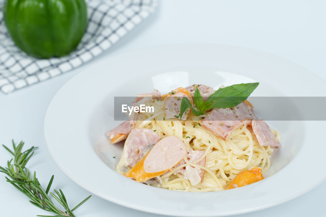 food, food and drink, healthy eating, plate, herb, wellbeing, vegetable, dish, produce, freshness, meal, cuisine, no people, fruit, italian food, spaghetti, indoors, plant, dinner, pasta, meat, seafood, spice, lunch, business, studio shot, savory food, leaf, basil