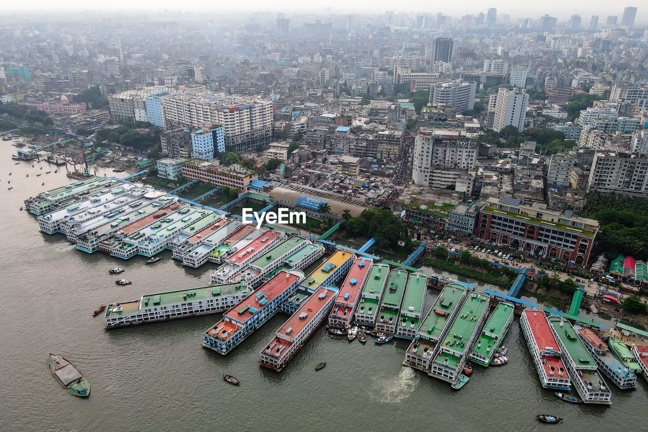 High angle view of illuminated buildings in city