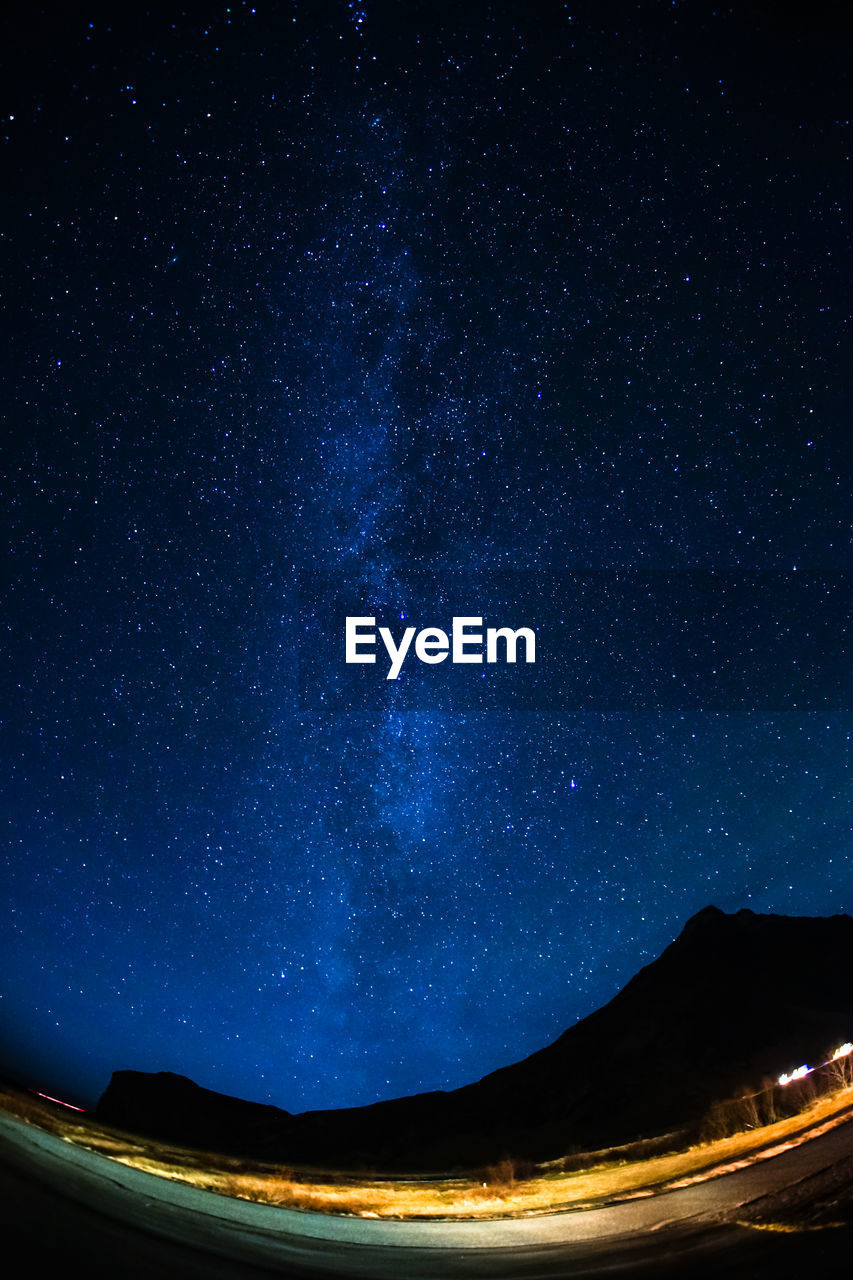 Scenic view of star field against sky at night