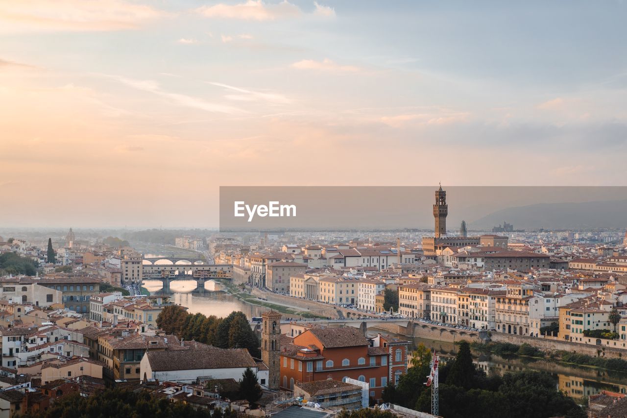 High angle view of cityscape against sky at sunset