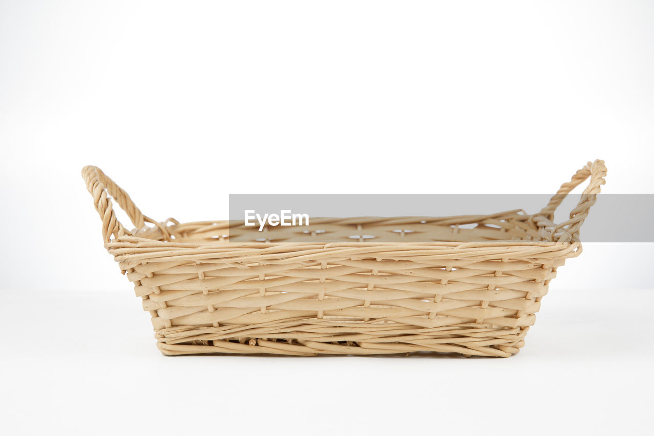 CLOSE-UP OF WICKER BASKET