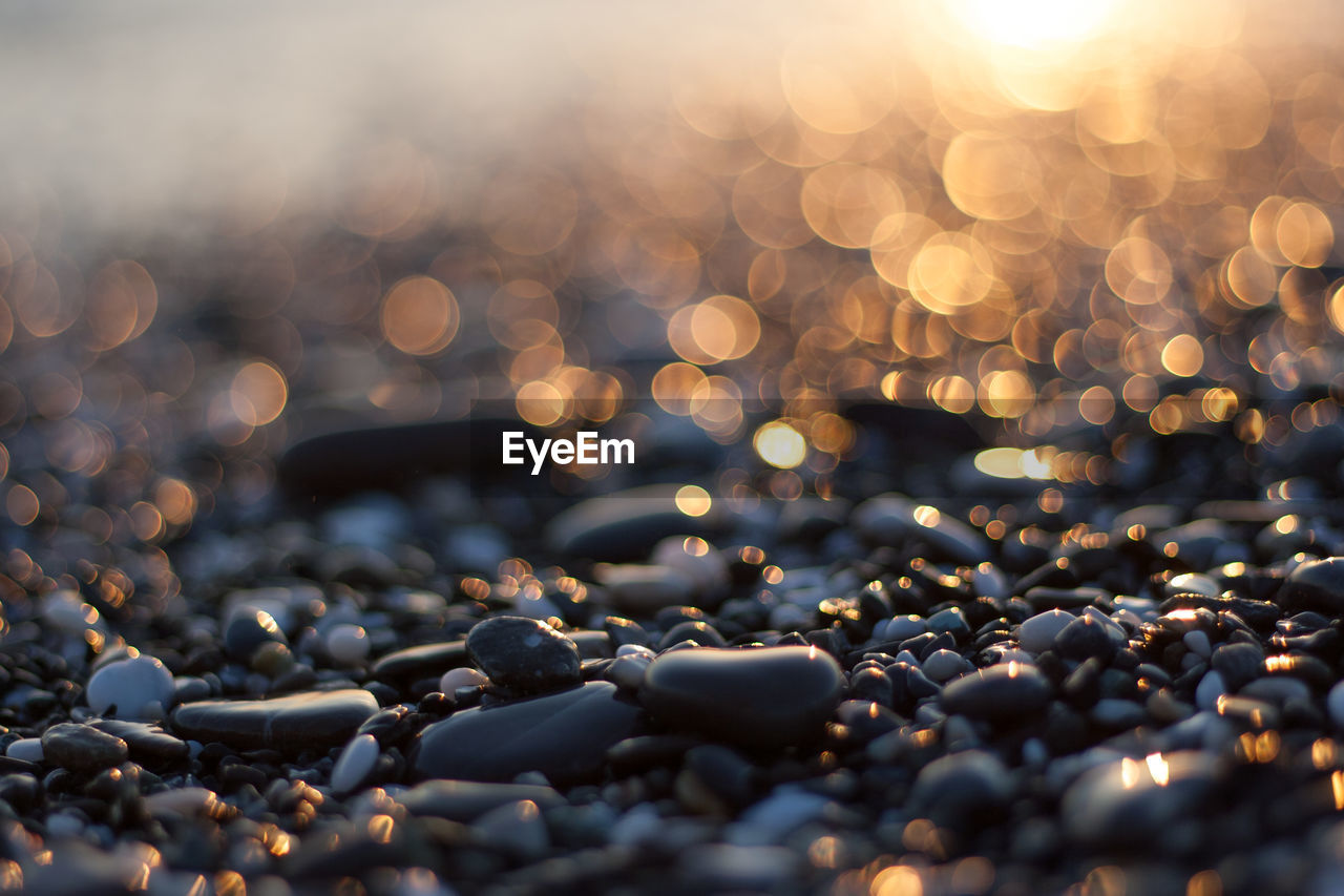 CLOSE-UP OF STONES ON PEBBLES