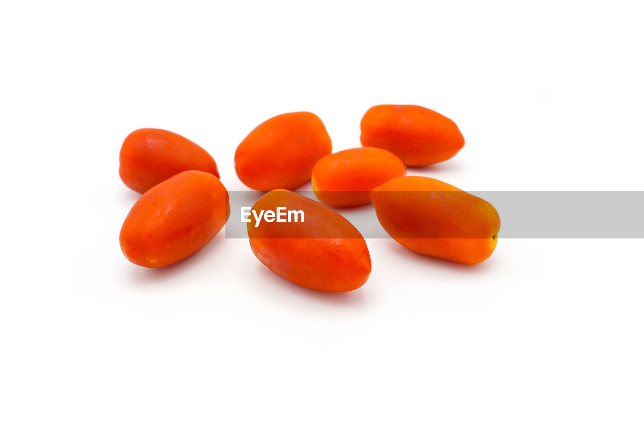 orange, food, food and drink, healthy eating, produce, wellbeing, cut out, white background, freshness, vitamin, studio shot, medicine, vegetable, plant, orange color, fruit, indoors, healthcare and medicine, no people, pill, dose, nutritional supplement, red, close-up, group of objects, still life, antioxidant