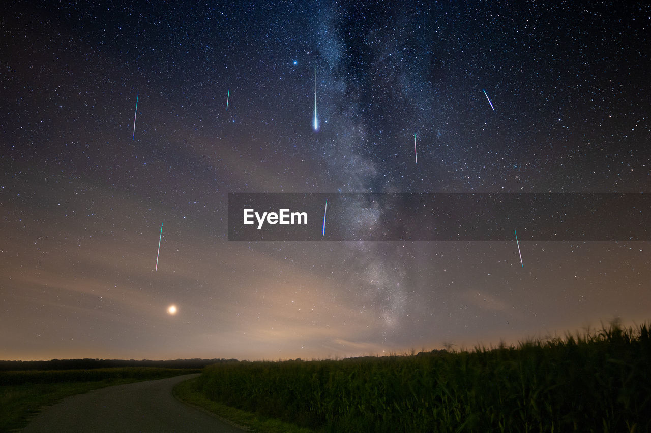 Low angle view of star trail at night