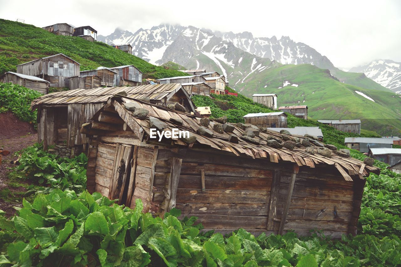 Low angle view of houses on mountain