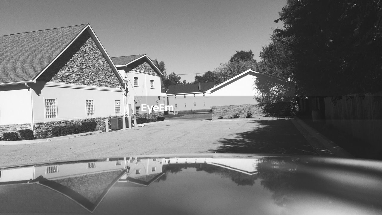 EMPTY ROAD ALONG BUILDINGS