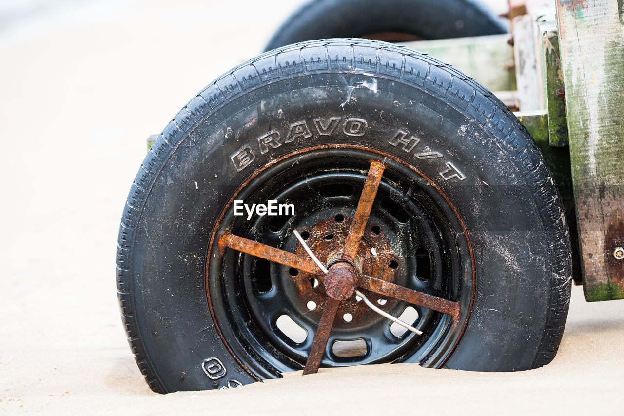 CLOSE-UP OF ABANDONED CAR