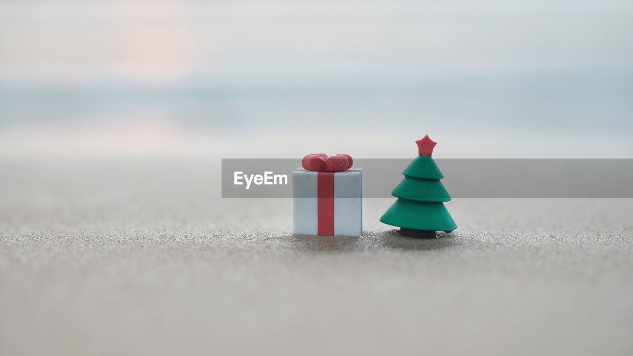 Close-up of christmas decoration at beach