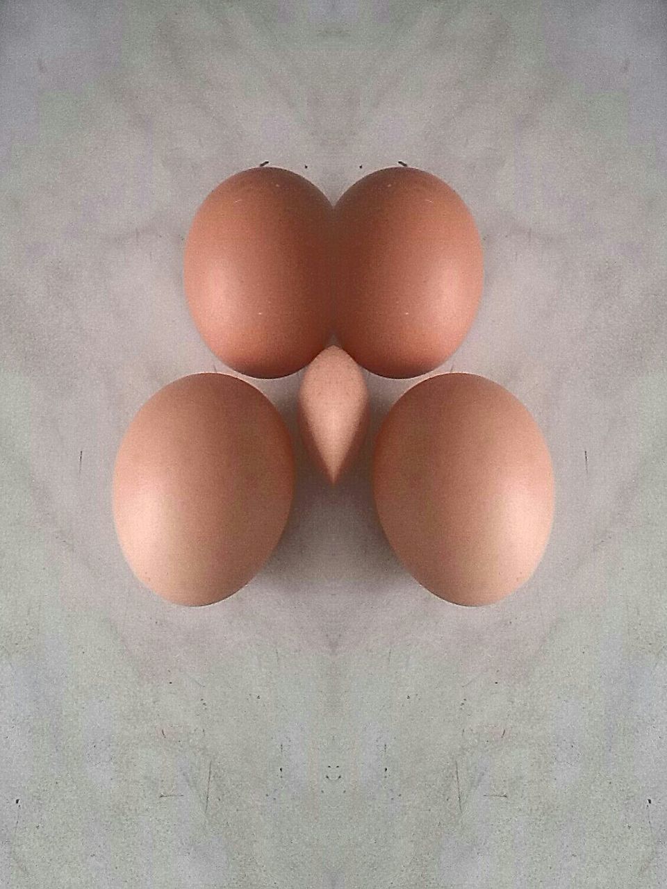 CLOSE-UP OF EGGS ON TABLE