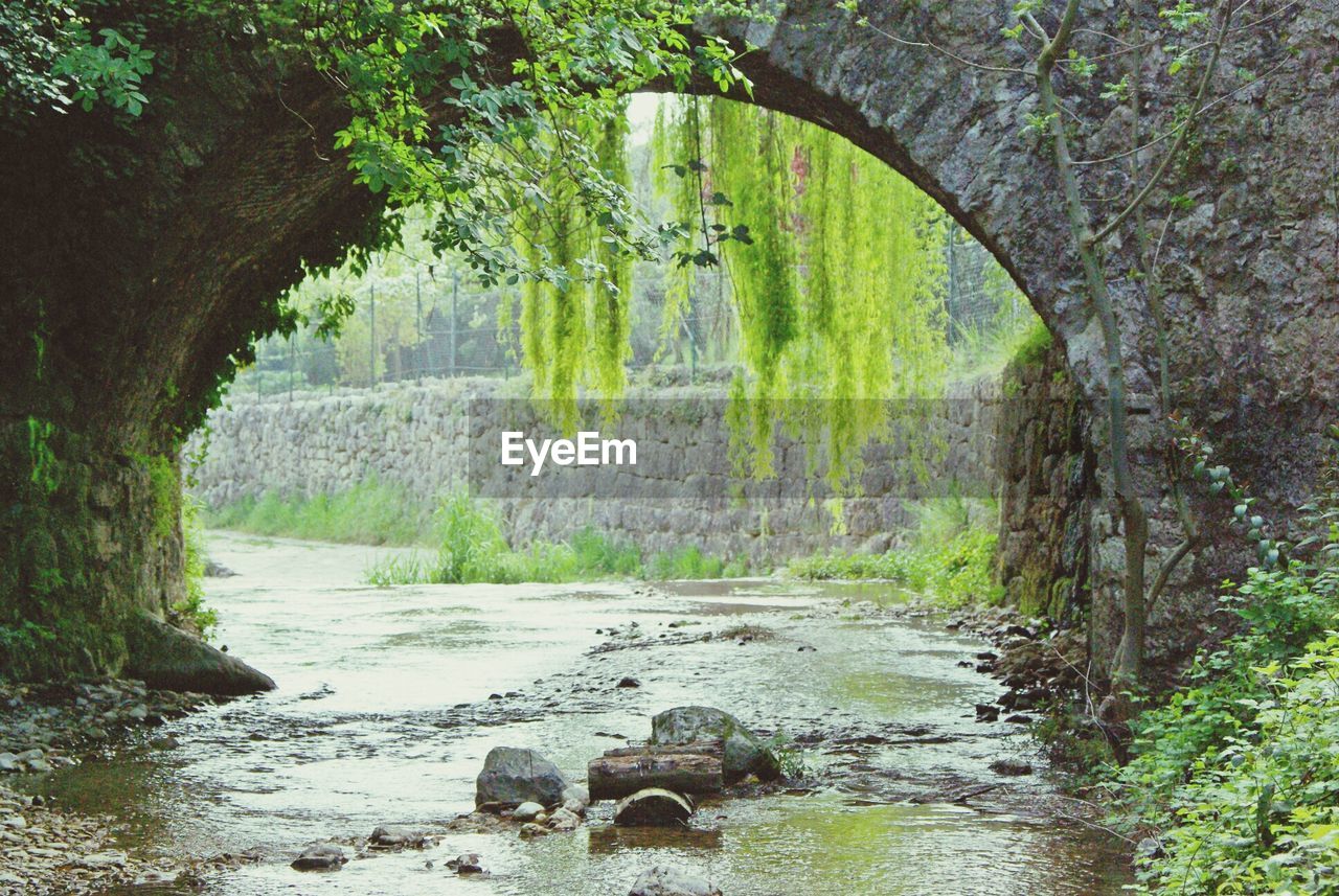 Stone wall over lake 