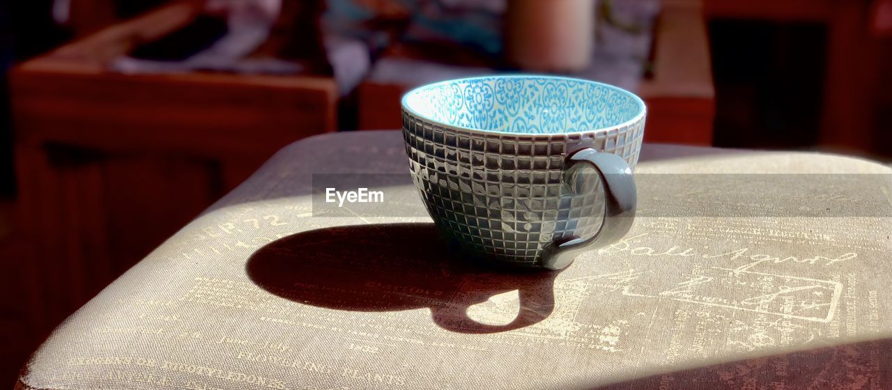 CLOSE-UP OF COFFEE SERVED ON TABLE