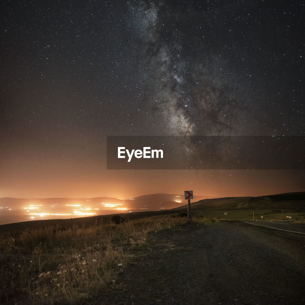 scenic view of mountains against sky at night
