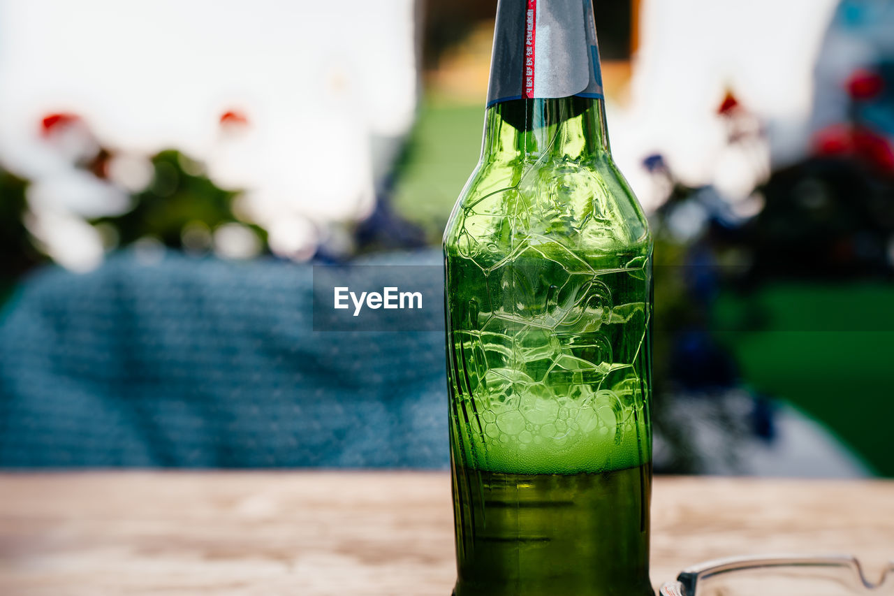 Close-up of beer glass on table