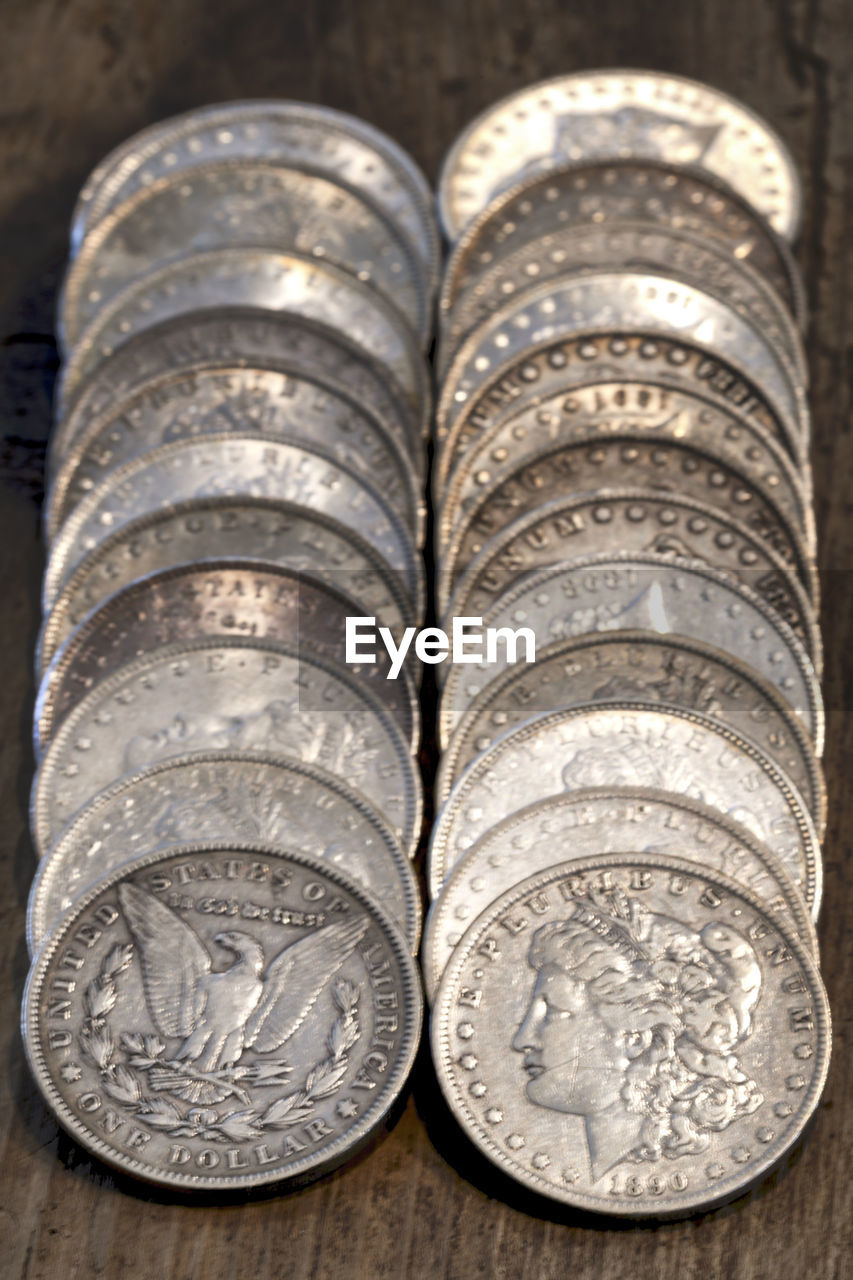 HIGH ANGLE VIEW OF COINS