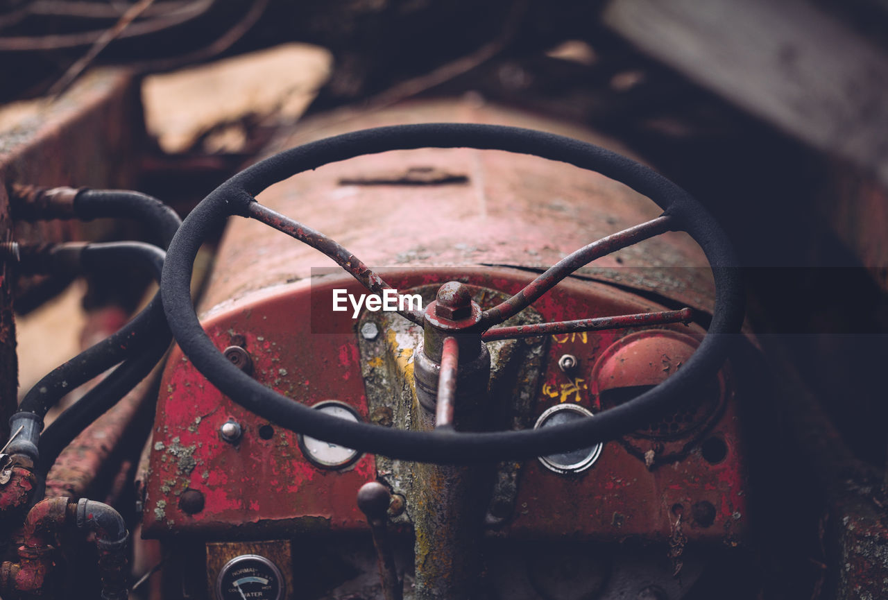 Close-up of abandoned tractor