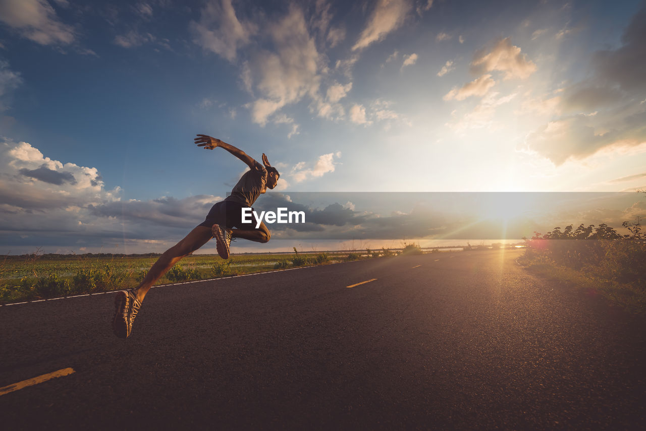 Athlete runner feet running on road, jogging concept at outdoors. man running for exercise.