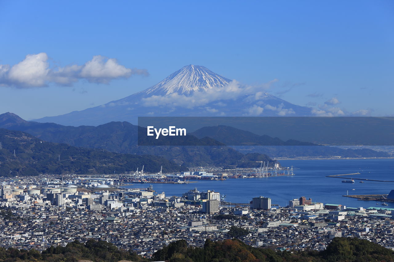 Fuji mountain and fujiyoshida town against sky