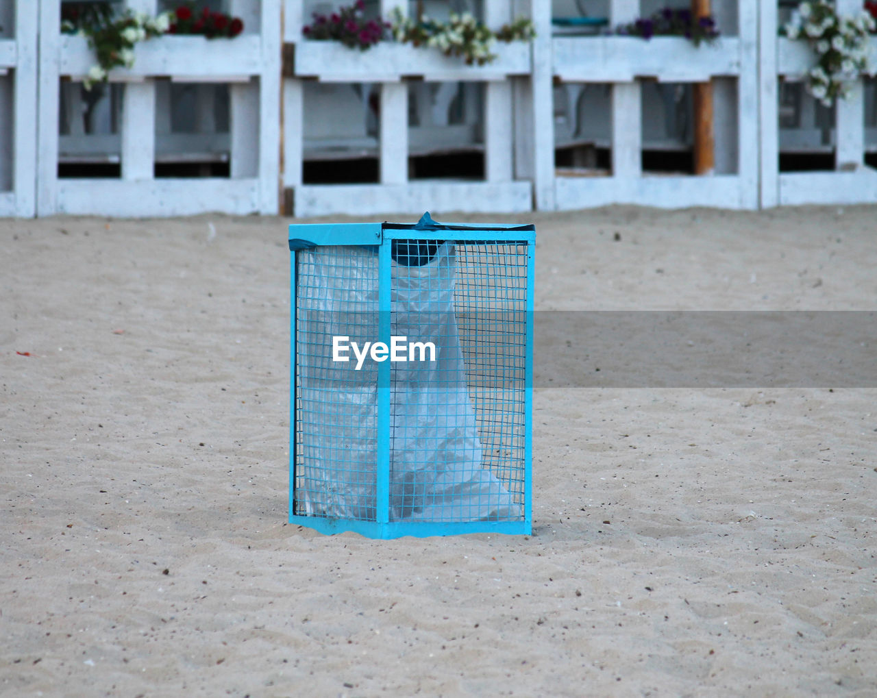 Close-up of chair on beach