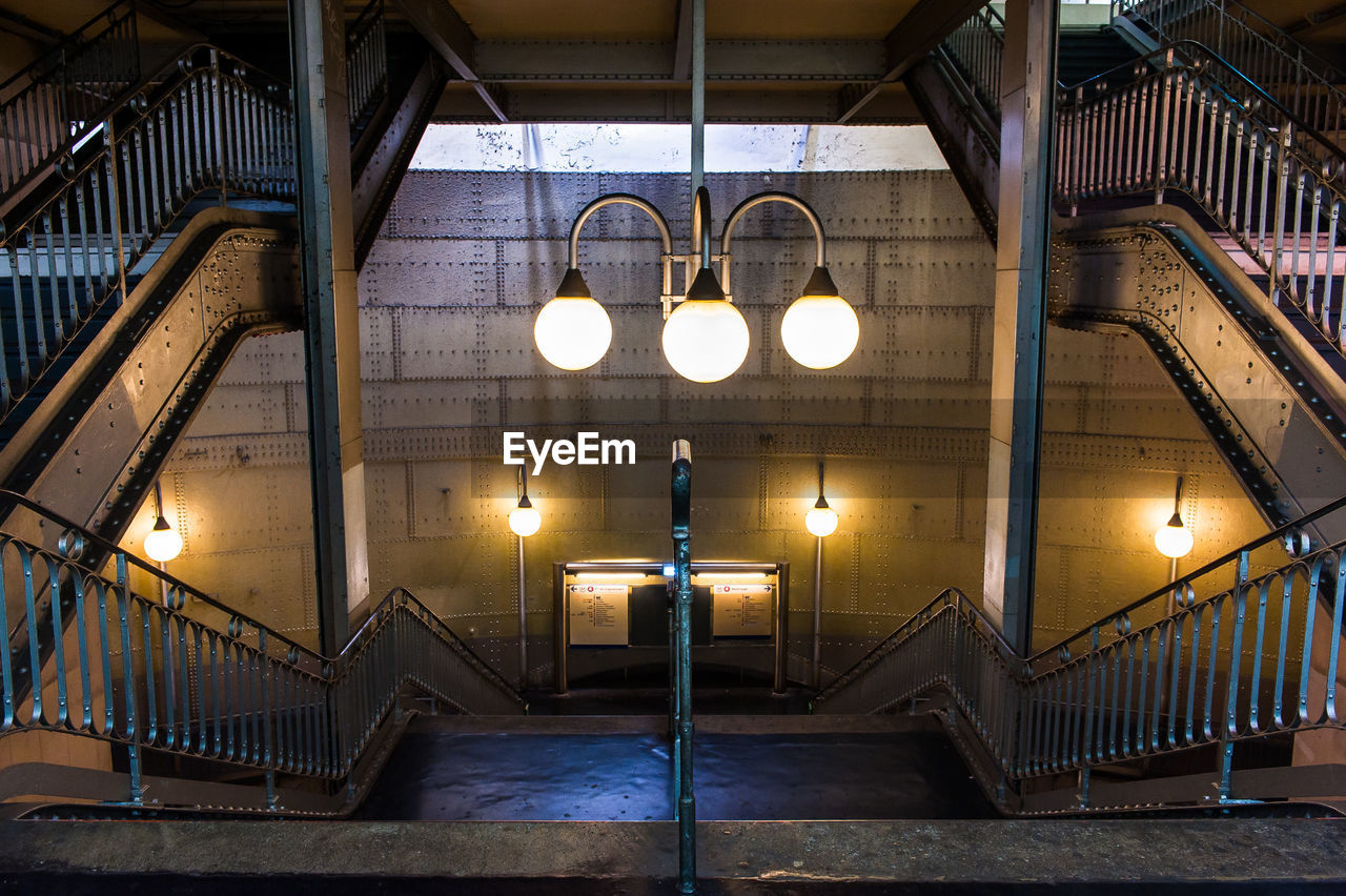 STAIRCASE IN ILLUMINATED BUILDING