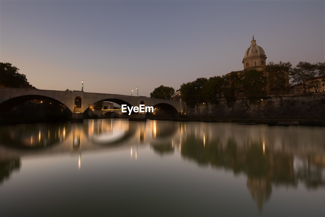 REFLECTION OF CHURCH IN RIVER