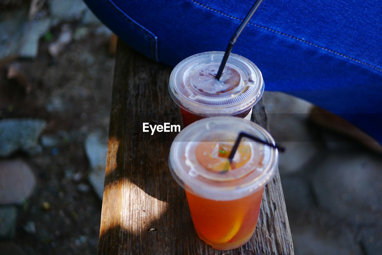 CLOSE-UP OF DRINK ON TABLE