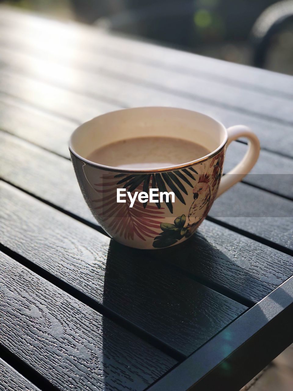 High angle view of coffee cup on table