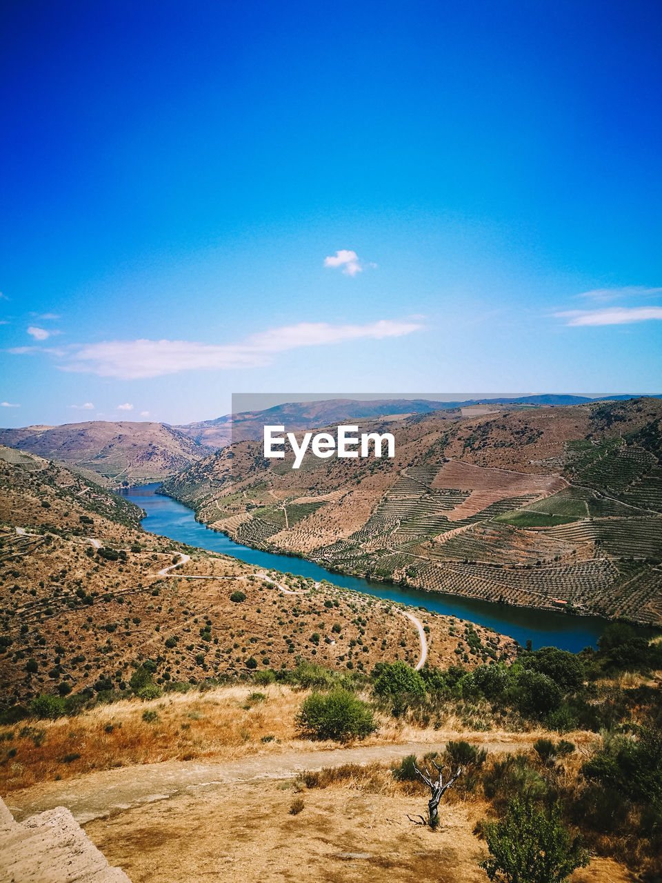 SCENIC VIEW OF LANDSCAPE AND BLUE SKY