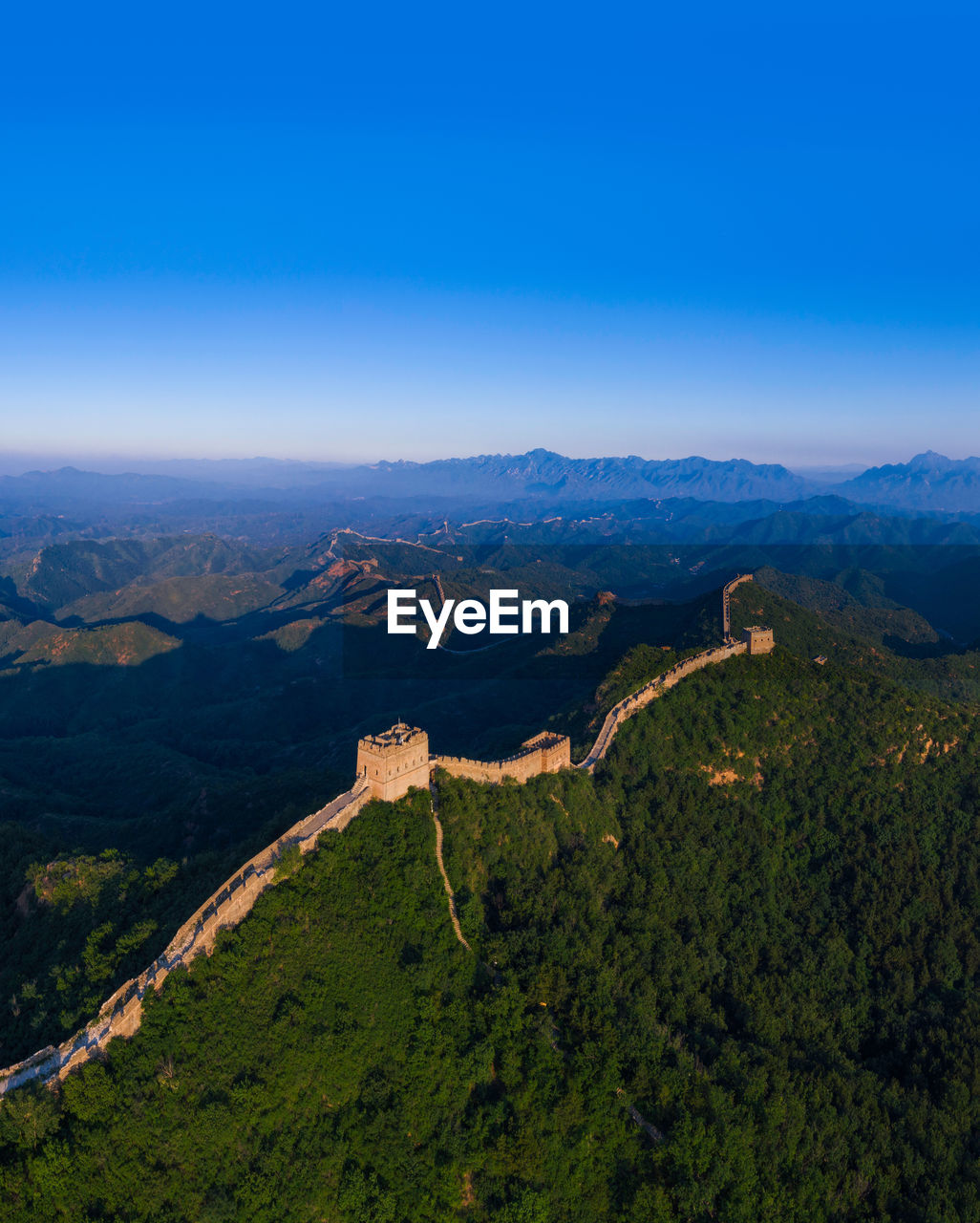 Aerial view of the great wall under the blue sky