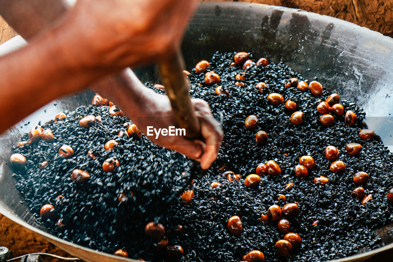 Close-up of person preparing food