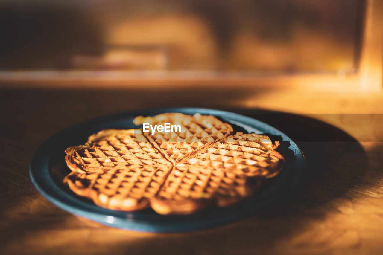 High angle view of waffles in plate on table