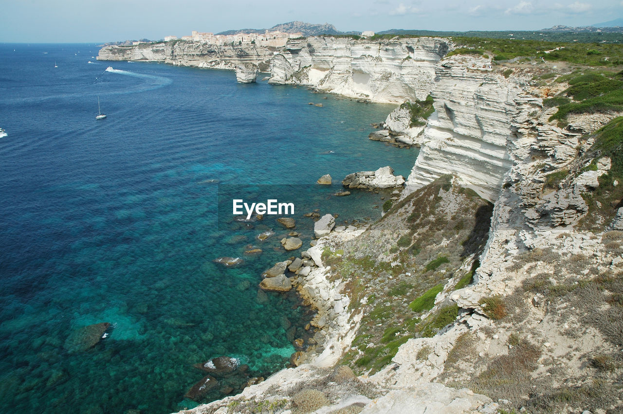 High angle view of sea and rocks