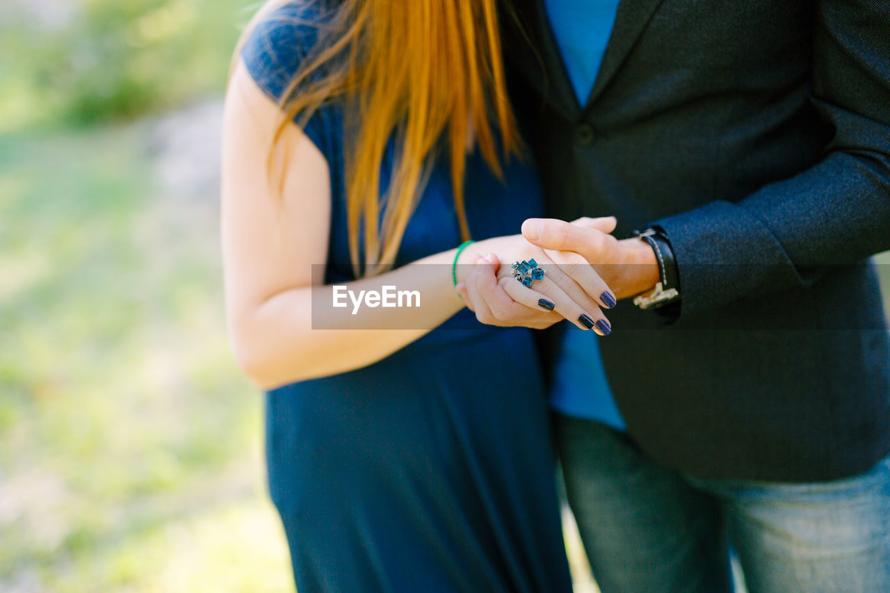 Close-up of woman holding hands