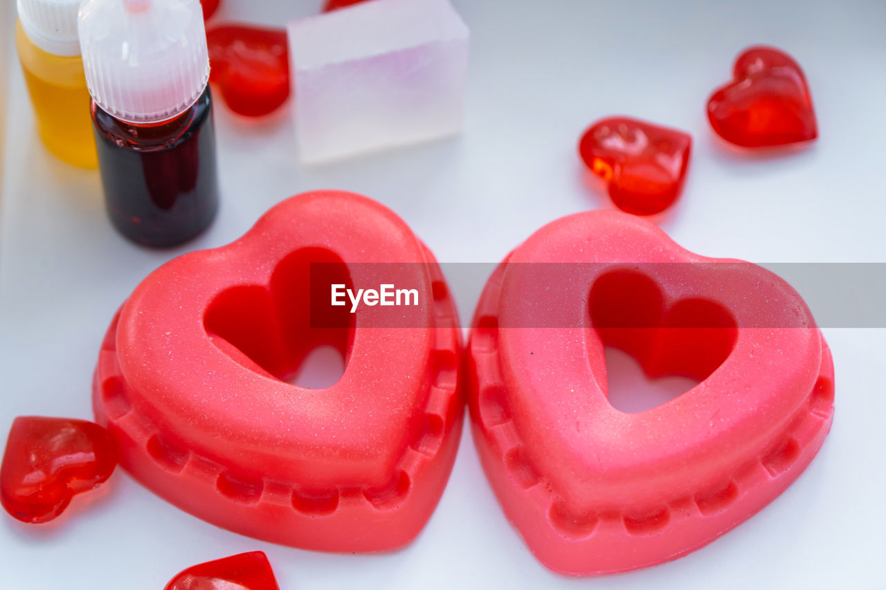 red, lip, pink, heart, love, no people, positive emotion, heart shape, studio shot, indoors, food and drink, healthcare and medicine, emotion, close-up, group of objects, food, container