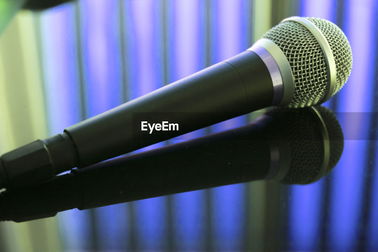 Close-up of microphone on table