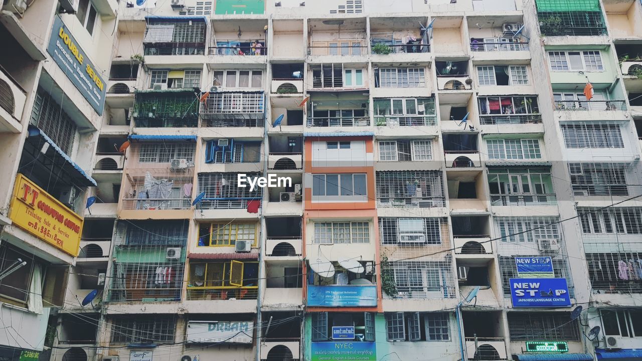 LOW ANGLE VIEW OF RESIDENTIAL BUILDING