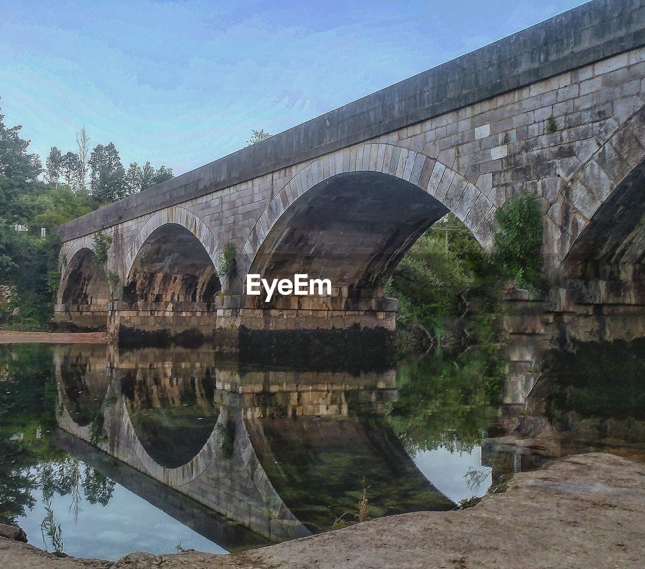 ARCH BRIDGE OVER RIVER