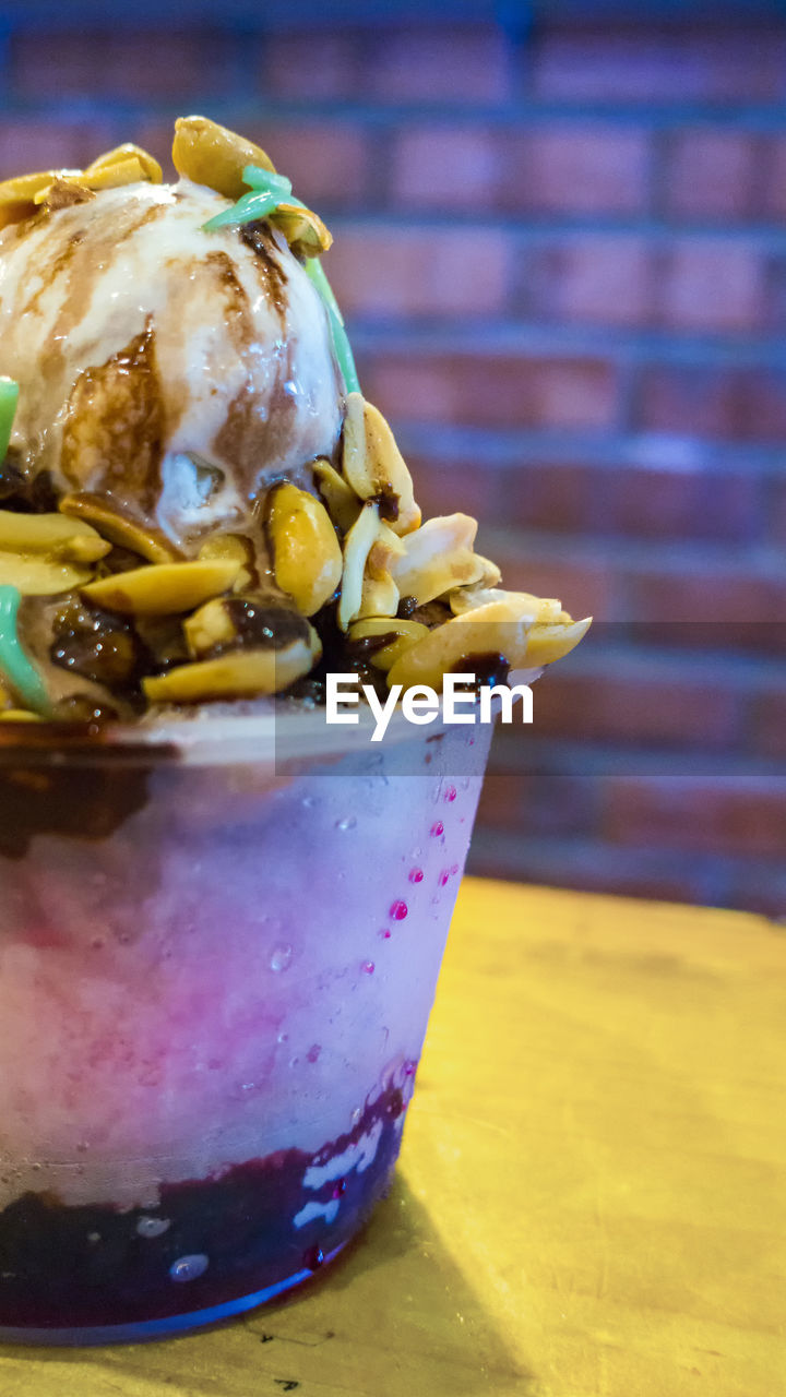 CLOSE-UP OF ICE CREAM WITH BOWL