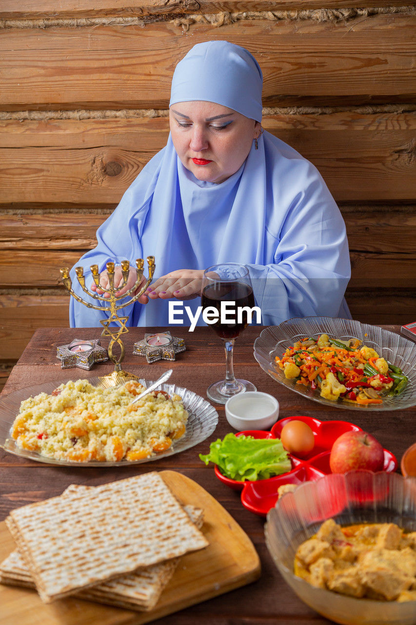 portrait of man preparing food in restaurant