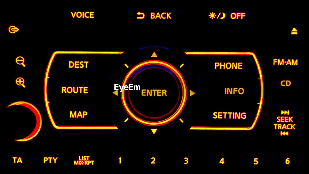 Full frame shot of illuminated music control panel