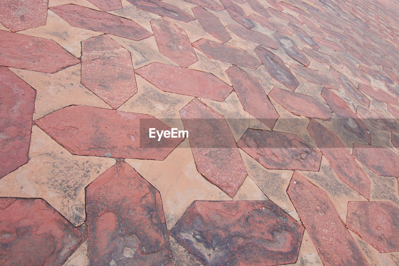 HIGH ANGLE VIEW OF STONE WALL