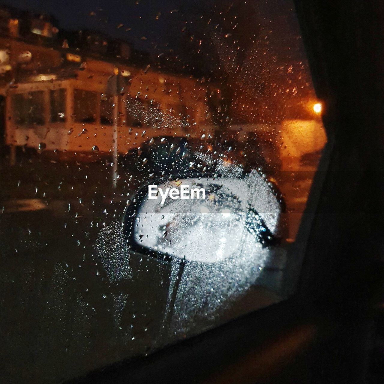 CLOSE-UP OF WET GLASS WINDOW